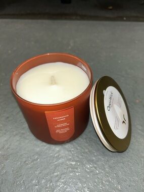 Cedarwood Amber Scented Candle - Orange Glass Jar, Smells amazing.